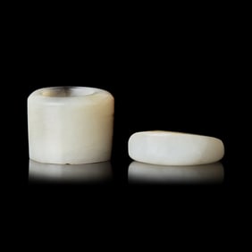 Two Chinese Russet and White Jade Archer's Rings, Qing Dynasty 清 白玉留