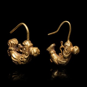 A Matched Pair of Chinese Gold 'Capricorn' Earrings, Erhuan, Liao Dynasty 遼 摩羯