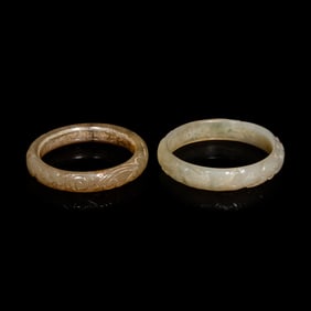 Two Chinese Carved Precious Stone Bangles, Qing Dynasty or Earlier 清或以前
