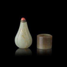 A Chinese Pale Celadon Jade Lobed Form Snuff Bottle and a Russet Jade Archer's Ring, 19th Century