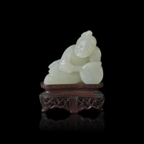 A Chinese White Jade Carved Boy, Qing Dynasty 清 白玉雕弄鼓