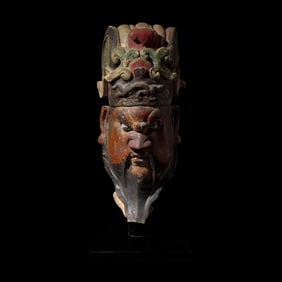 A Chinese Polychromed Stucco Head of a Celestial Judge, Ming Dynasty 明 彩繪
