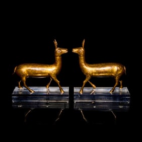 A Pair of Tibetan Gilt Bronze Kiang Donkeys, 18th/19th Century 十八/十九