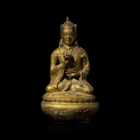 A Tibetan Gilt Copper Alloy Figure of Padmasambava, 18th/19th Century or Earlier 十八