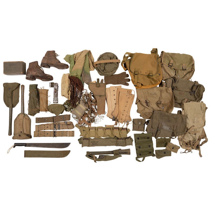 Group of WWII US Militaria: Group of WWII US Militaria World War II Mixed lot of US militaria from the World Wars era includes one pair of AEF marching shoes, six haversacks, two M1 Garand clip bandoliers with inert ammunition, 
