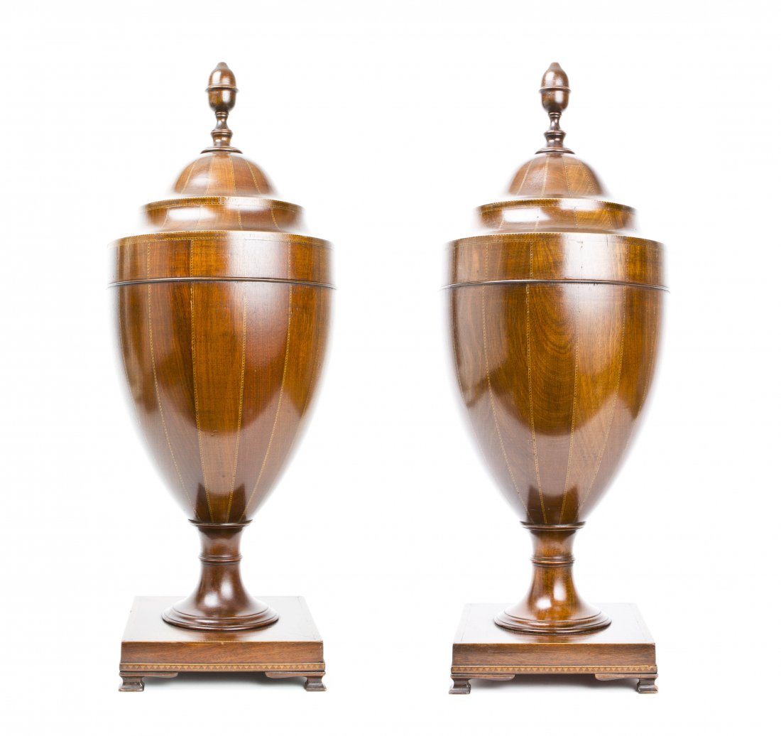 A Pair of Georgian Style Mahogany and Satinwood Inlaid : A Pair of Georgian Style Mahogany and Satinwood Inlaid Knife Urns, the telescopic lid having an acorn shaped finial over the line inlaid urns, opening to a fitted interior, raised on square pedestal b