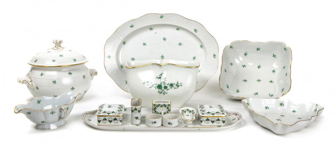 A Herend Porcelain Partial Dinner Service, Height of so: A Herend Porcelain Partial Dinner Service, in green and white, comprising 7 serving platters, a cache pot, 9 bowls, 10 bread plates, 12 luncheon plates, salt and pepper cellars, a toothpick holder, a