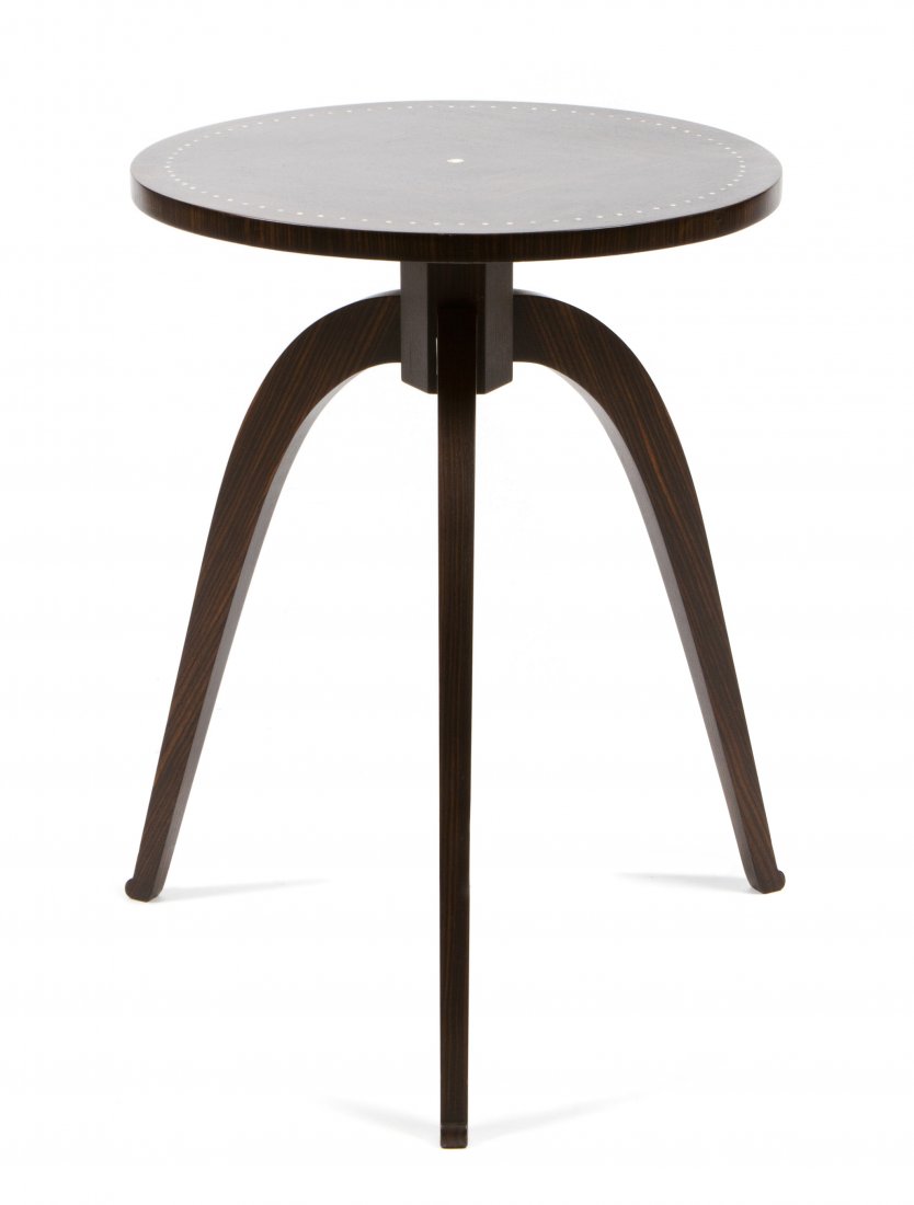 A French Art Deco Style Macassar and Horn Inset Occasio: A French Art Deco Style Macassar and Horn Inset Occasional Table, having a round top with repeating circular decoration, raised on a tripod base. Height 24 x diameter 17 3/4 inches.