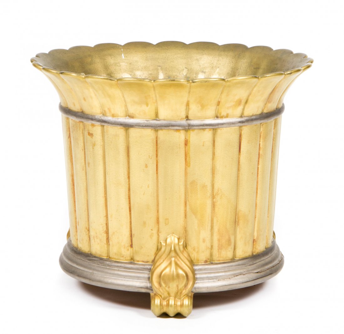 A French Gilt Plaster Jardiniere, Jacques Molin for Lor: A French Gilt Plaster Jardiniere, Jacques Molin for Lorin Marsh, of circular tapering form having a scalloped rim, over the conforming lobed body, raised on paw feet. Height 17 3/4 x diameter 21 3/4 i