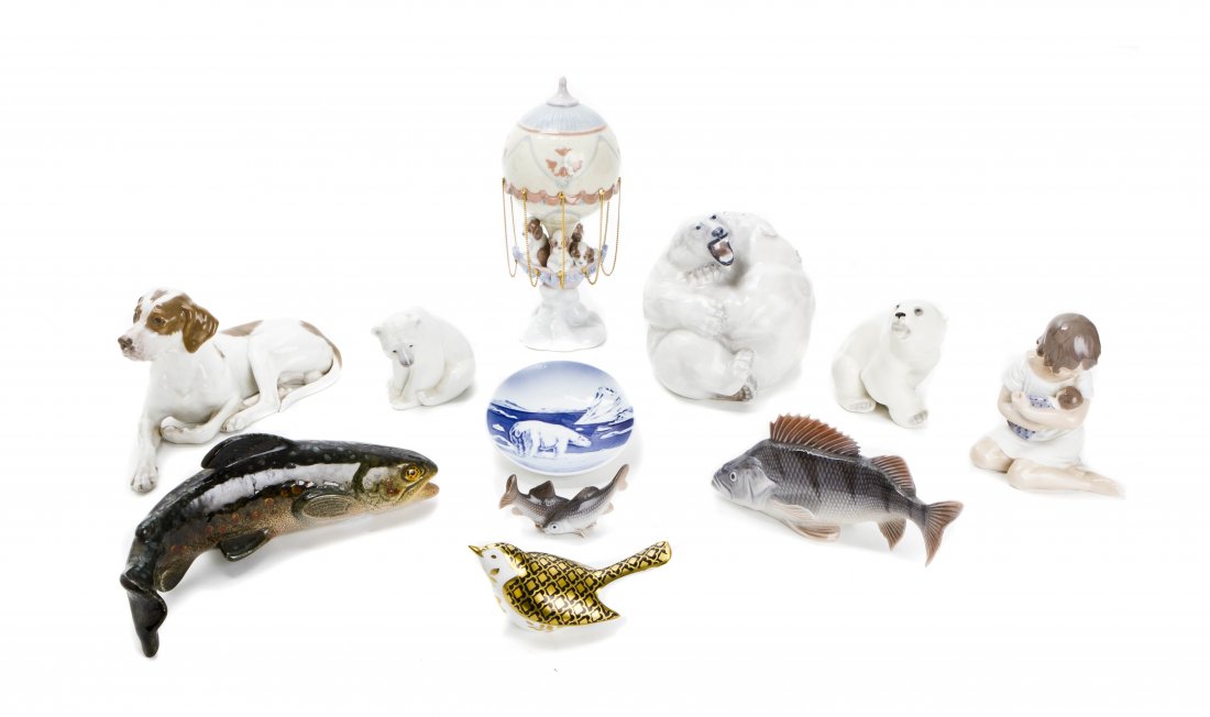 A Collection of Eleven Porcelain Figures, Height of tal: A Collection of Eleven Porcelain Figures, comprising six Royal Copenhagen examples of a dog, a fish, a seated child, a plate, a pair of fish and a pair of polar bears, two Lladro examples of a hot air
