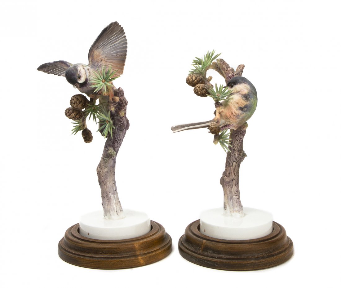 A Pair of Royal Worcester Dorothy Doughty Birds, Chicka: A Pair of Royal Worcester Dorothy Doughty Birds, Chickadees, perched on larch branches. Height 9 3/4 inches. Property from the Estate of Barbara Archer Thomas, Naples, Florida