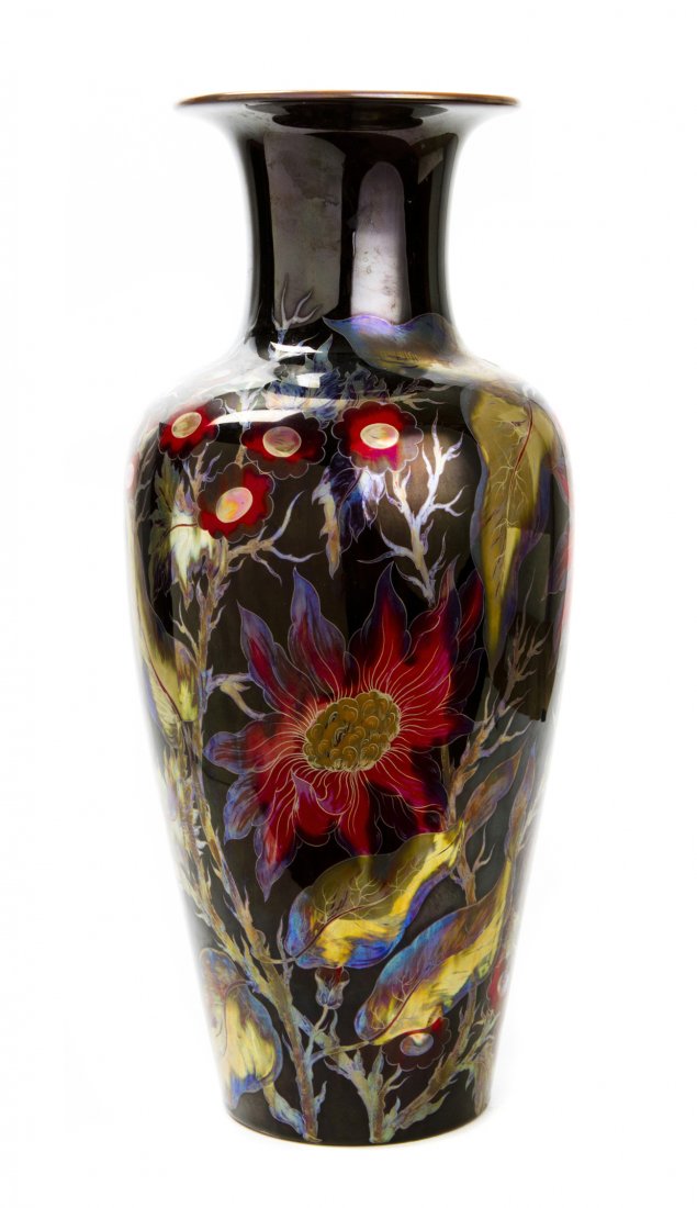 A Zsolnay Iridescent Vase, Height 16 3/4 inches.: A Zsolnay Iridescent Vase, with allover floral decoration on a dark background, the bottom inscribed and signed. Height 16 3/4 inches. Property from the Estate of Gyula Serfozo, Boca Raton, Florida.