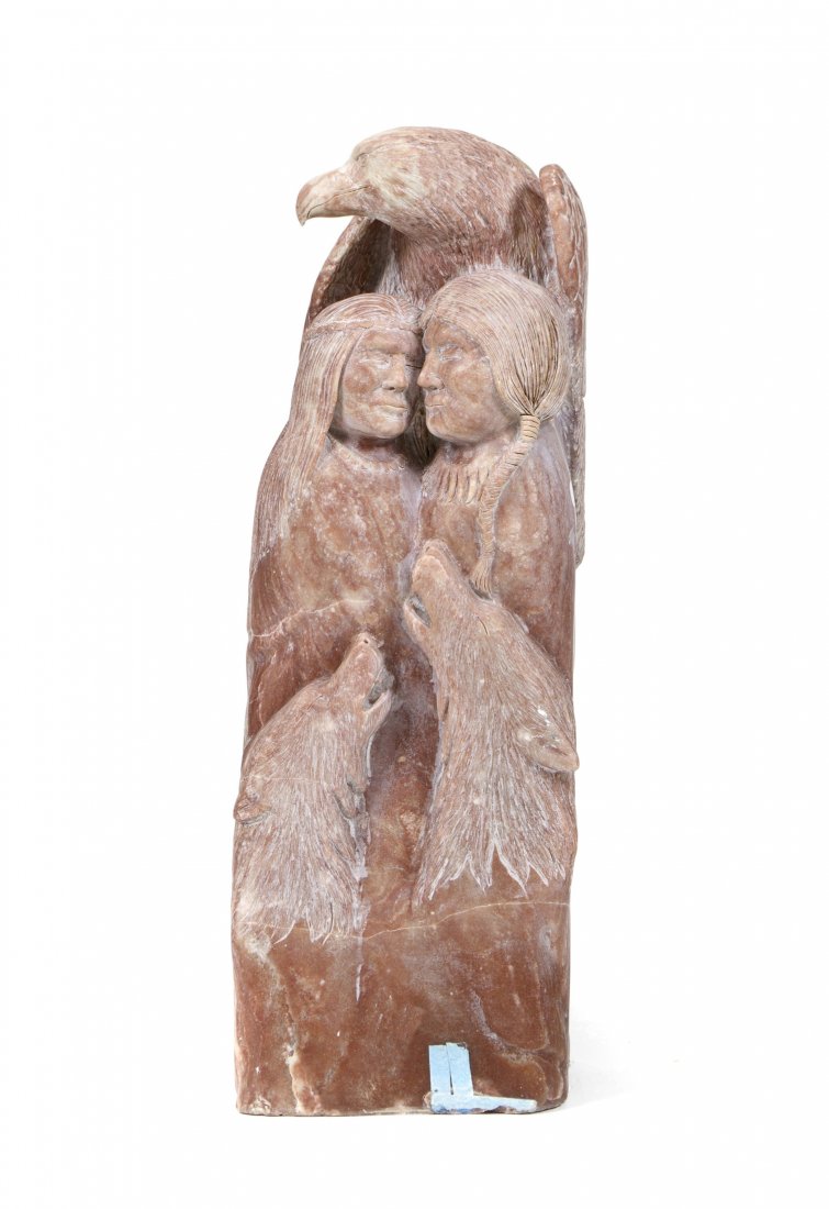Clifford Pettman, (Canadian, b. 1946), An American Indi: Clifford Pettman (Canadian, b. 1946) An American Indian Couple with a Pair of Wolves and a Protective Eagle carved soapstone Height: 38 1/2 inches. Property from The Hascoe Collection