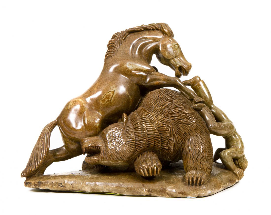 Clifford Pettman, (Canadian, b. 1946), An American Indi: Clifford Pettman (Canadian, b. 1946) An American Indian Bear Hunter carved soapstone Height: 12 inches. Property from The Hascoe Collection