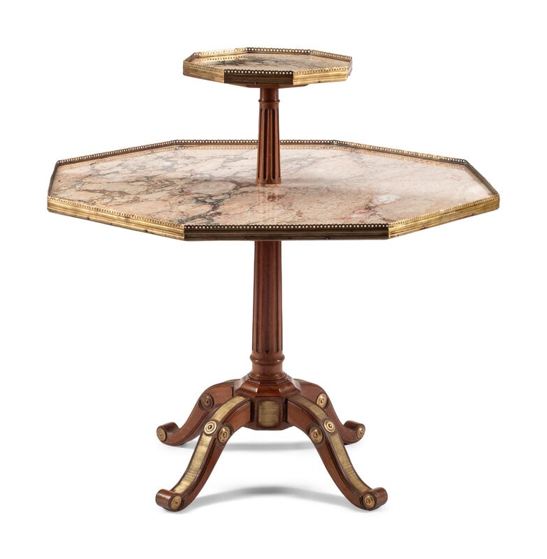 A Louis XVI Style Gilt Bronze Mounted Walnut Two-Tier Table: A Louis XVI Style Gilt Bronze Mounted Walnut Two-Tier Table 20th Century Height 38 x diameter 36 ½ inches. This lot is located in Chicago.