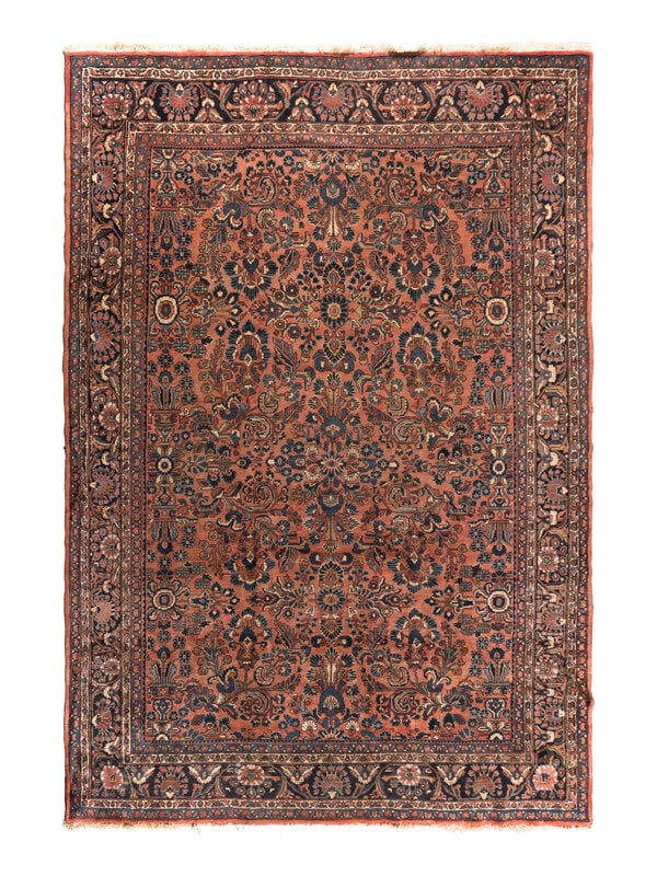 A Sarouk Wool Rug: A Sarouk Wool Rug Circa 1920s 12 feet 1 inch x 8 feet 10 inches. Property from the Collection of Catharine and David Hamilton, Chicago, Illinois This lot is located in C