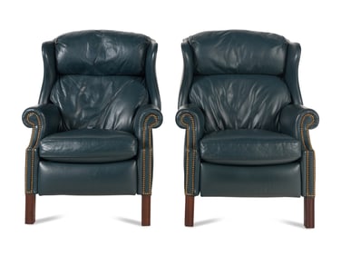 A Pair of George III Style Mahogany and Leather Upholstered Reclining Wingback Chairs