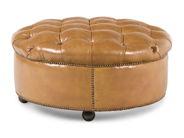 A Button-Tufted Leather Ottoman