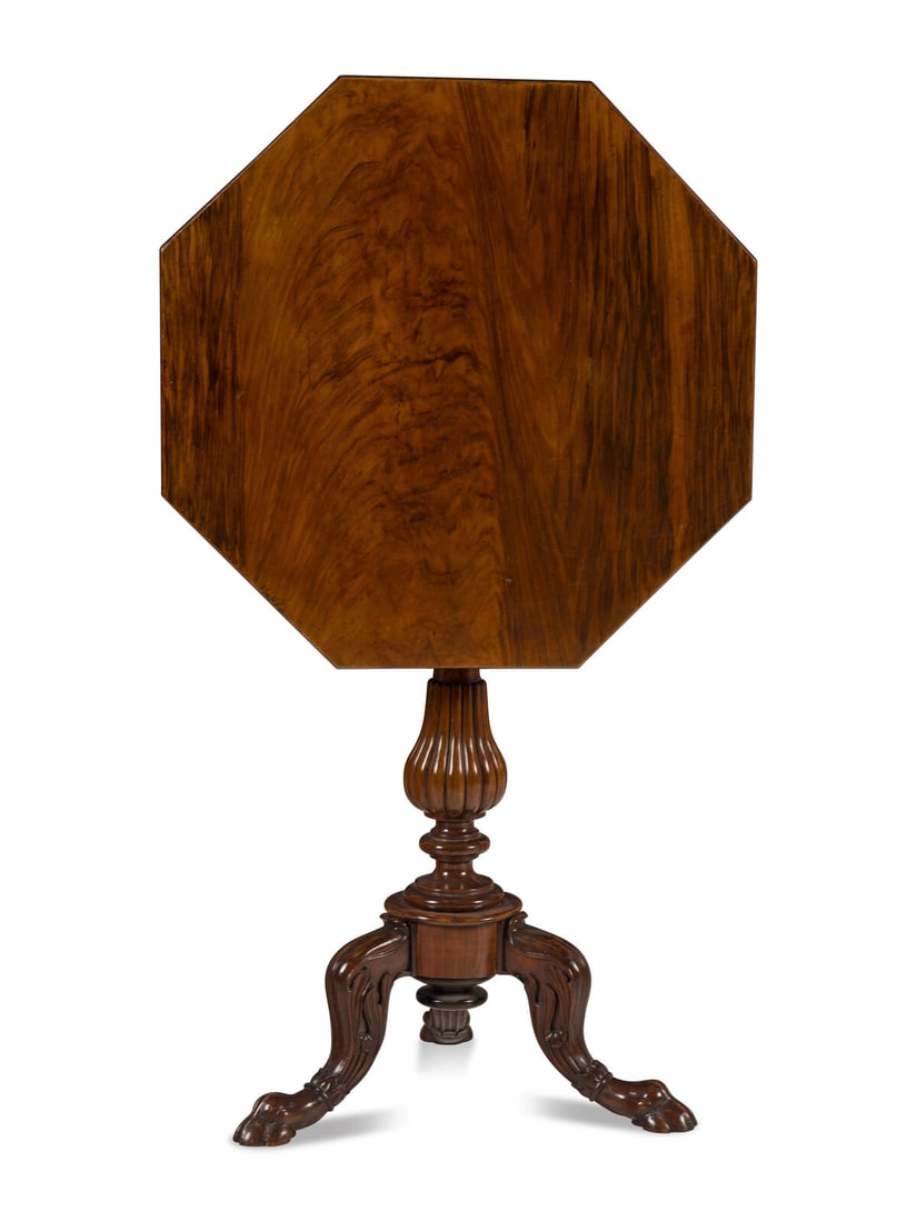 A German Mahogany and Grain-Painted Tripod Table: A German Mahogany and Grain-Painted Tripod Table Circa 1830-40 the top with grain-painted elements and raised on a fluted vasiform stem with cabriole legs ending in paw feet. Height 30 x width 24 1/4