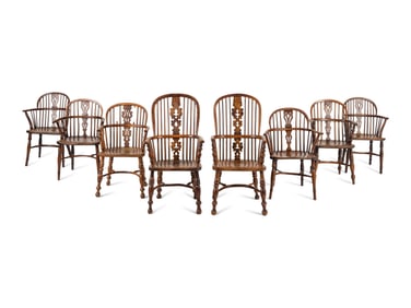 An Assembled Set of Nine Yew, Elm and Beechwood Windsor Armchairs