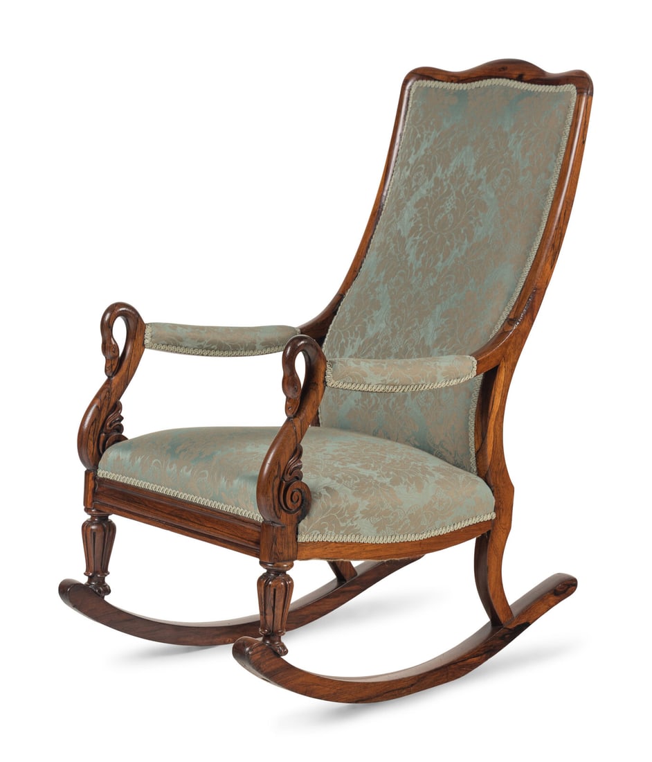 An Empire Style Rosewood Rocking Chair: An Empire Style Rosewood Rocking Chair 19th Century Height 44 1/4 x width 21 1/2 x depth 35 1/4 inches. This lot is located in Chicago.