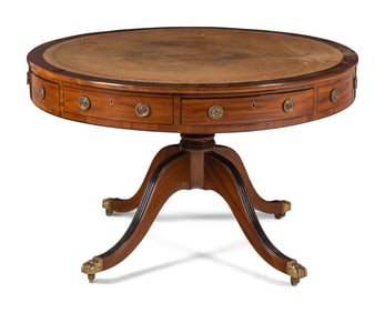 A George III Mahogany and Parcel Ebonized Drum Table