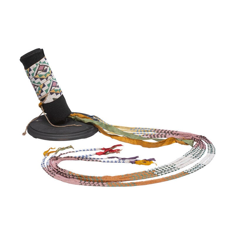 Ho Chunko Woman's Hair Wrap, Silk Ribbon: Ho Chunko Woman's Hair Wrap, Silk Ribbon early 20th century tassel length 43 inches (not removed from mount) Condition Wall mount included. Provenance</