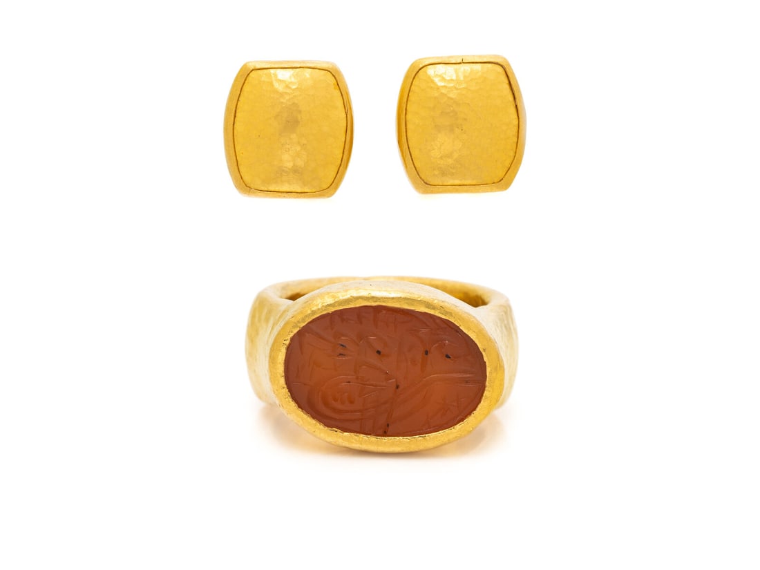 GURHAN, HIGH KARAT GOLD EARRINGS AND ISLAMIC INTAGLIO RING: GURHAN, HIGH KARAT GOLD EARRINGS AND ISLAMIC INTAGLIO RING Hammered finish earrings and ring, the ring set with a carnelian Islamic intaglio measuring approximately 15.25 x 10.10 mm. 24 karat yellow g