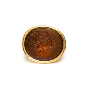 YELLOW GOLD AND AMAZONOMACHY SCENE INTAGLIO RING