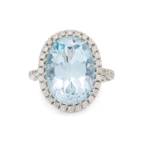BLUE TOPAZ, DIAMOND, AND WHITE GOLD RING