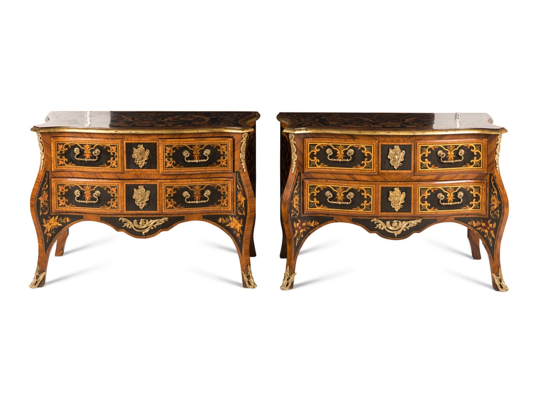 A Pair of Louis XIV Style Gilt Bronze Mounted Marquetry Commodes: A Pair of Louis XIV Style Gilt Bronze Mounted Marquetry Commodes 20th Century Height 35 3/4 x width 52 x depth 24 inches. Property of a California Collector This lot is located in Chicago.