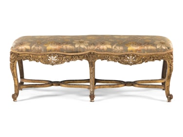 A Louis XV Carved Giltwood Window Bench