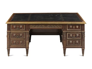 A Louis XVI Style Gilt Metal Mounted Mahogany Pedestal Desk