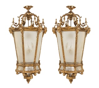A Pair of Louis XVI Style Gilt Bronze and Frosted Glass Hall Lanterns