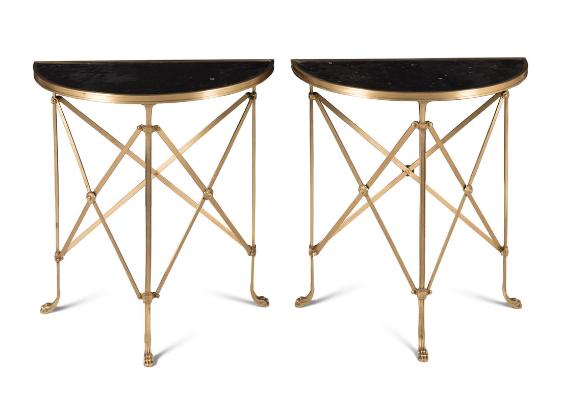 A Pair of Empire Style Gilt Bronze and Marble-Top Demilune Console Tables: A Pair of Empire Style Gilt Bronze and Marble-Top Demilune Console Tables 20th Century Height 26 1/4 x width 24 x depth 12 1/4 inches. Property of a California Collector This lot is located in Chicago