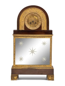 A Charles X Gilt and Patinated Bronze and Mirrored Glass Mantel Clock