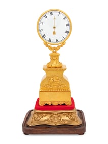 A Louis Philippe Gilt Bronze Mystery Clock