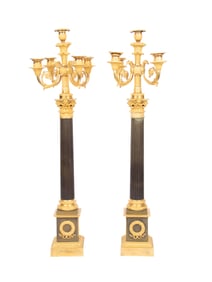 A Pair of Directoire Style Gilt and Patinated Bronze Five-Light Candelabra