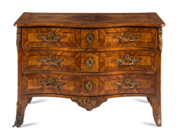 A Continental Gilt Bronze Mounted Burlwood Serpentine Commode
