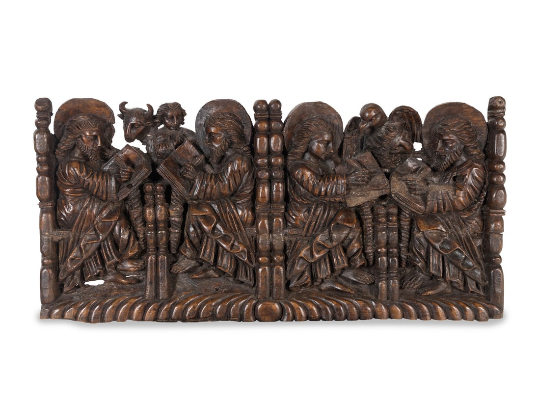 A Spanish Colonial Walnut Frieze Depicting the Four Evangelists (1 of 3)