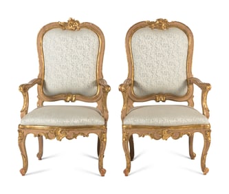 A Pair of Italian Rococo Painted and Parcel Gilt Armchairs
