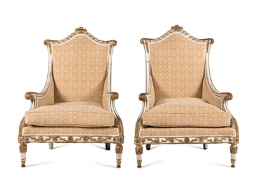 A Pair of Continental Painted and Parcel Gilt Bergères
