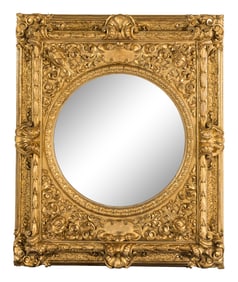 A Baroque Style Giltwood and Gesso Mirror
