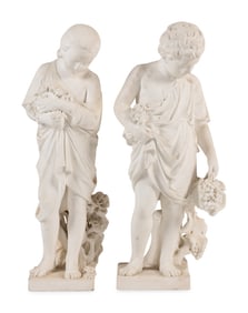 A Pair of Italian Carved Marble Figures of a Boy and Girl