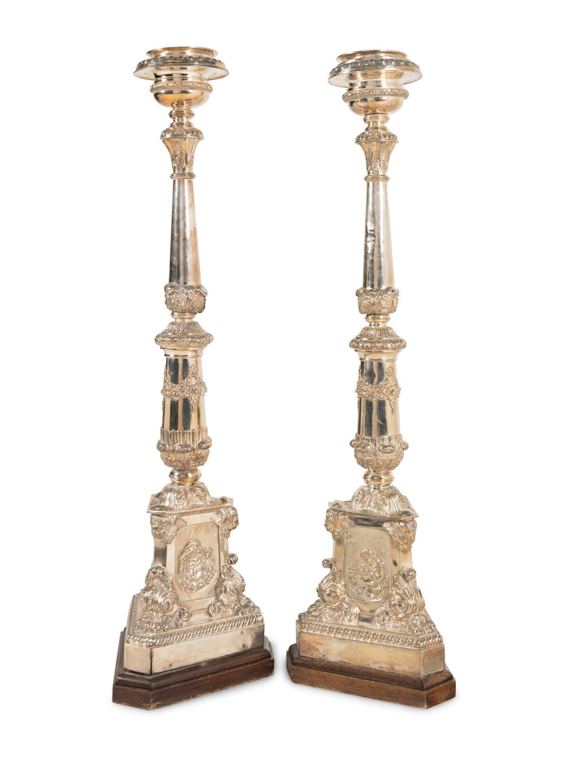 A Pair of Monumental Silvered Metal Altar Sticks: A Pair of Monumental Silvered Metal Altar Sticks First Half 20th Century each with an oak base. Height 65 x width 17 x depth 15 inches. Property of a California Collector This lot is located in Chicag