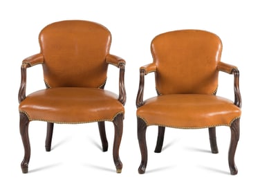 A Near Pair of George III Mahogany Leather-Upholstered Armchairs