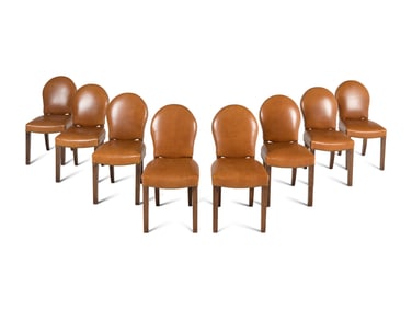 A Set of Eight Leather-Upholstered Dining Chairs