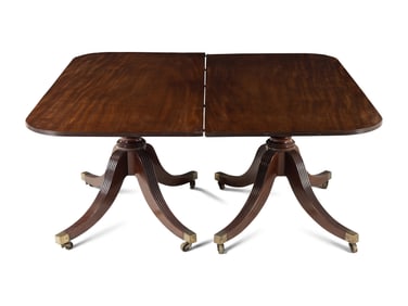 A Regency Mahogany Triple Pedestal Dining Table