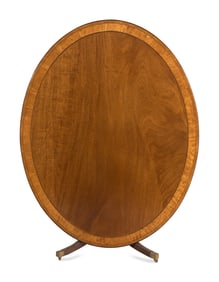 A Regency Mahogany and Satinwood Tilt-Top Breakfast Table