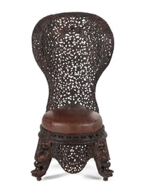 An Anglo-Indian Carved Hardwood Slipper Chair